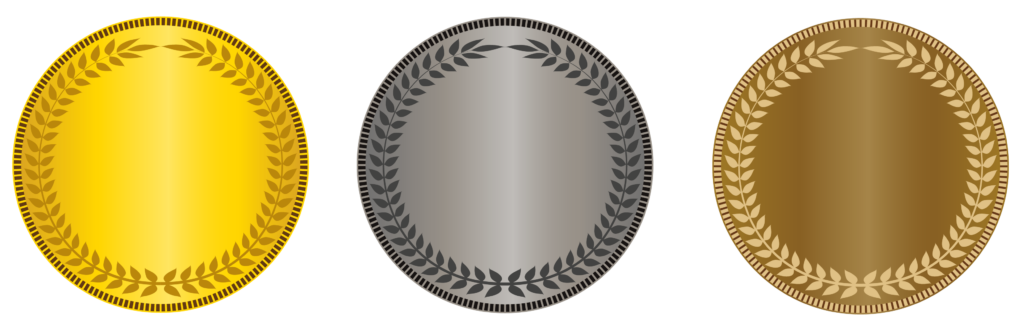 Three badges with laurels inside of them. From left to right, they are: gold, silver, and bronze.